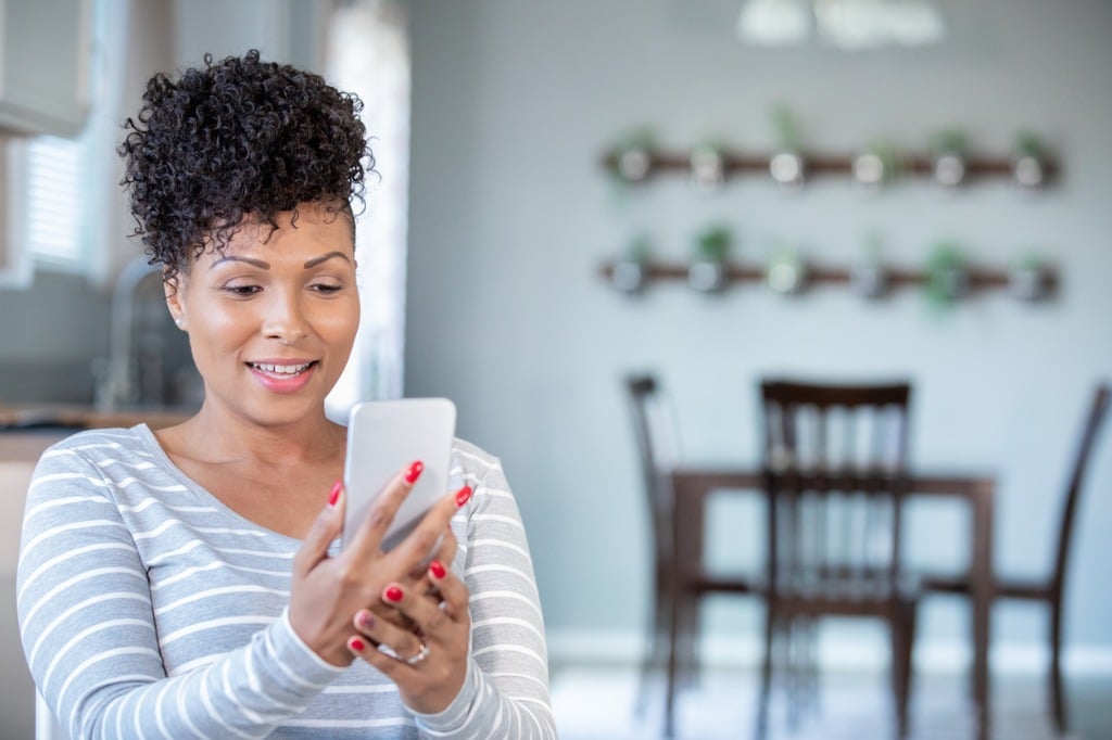 woman on telehealth appointment with therapist